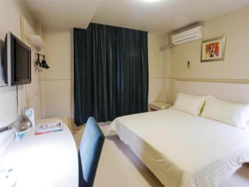 Imagen de la habitación del Hotel Jingjiang Inn Wuxi Liyuan Development Zone. Foto 7