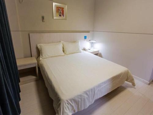 Imagen de la habitación del Hotel Jingjiang Inn Wuxi Liyuan Development Zone. Foto 8