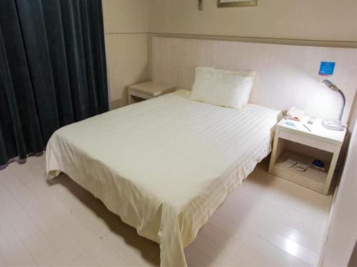 Imagen de la habitación del Hotel Jingjiang Inn Wuxi Liyuan Development Zone. Foto 9