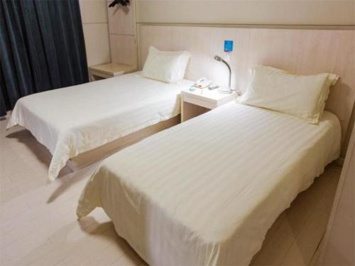 Imagen de la habitación del Hotel Jingjiang Inn Wuxi Liyuan Development Zone. Foto 10