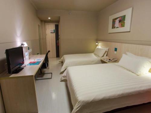 Imagen de la habitación del Hotel Jingjiang Inn Zhenjiang Jingkou Xuefu Road. Foto 7