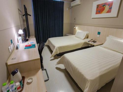 Imagen de la habitación del Hotel Jingjiang Inn Zhenjiang Jingkou Xuefu Road. Foto 8