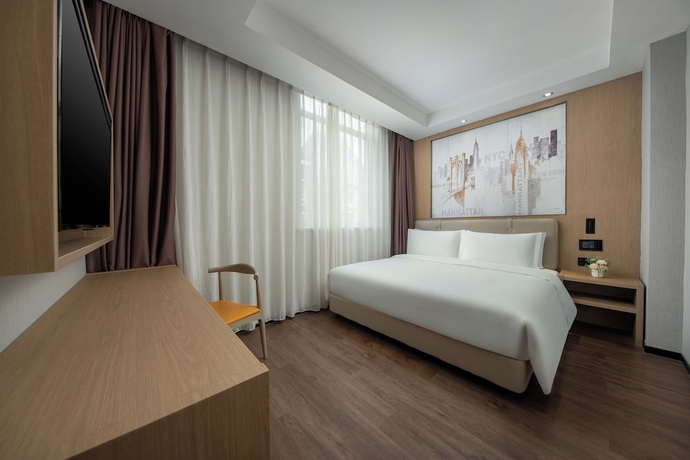 Imagen de la habitación del Hotel JinglaiMeichuan Road Branch. Foto 2