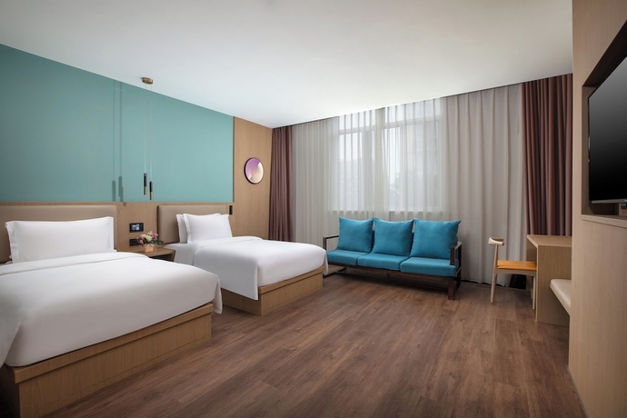 Imagen de la habitación del Hotel JinglaiMeichuan Road Branch. Foto 3