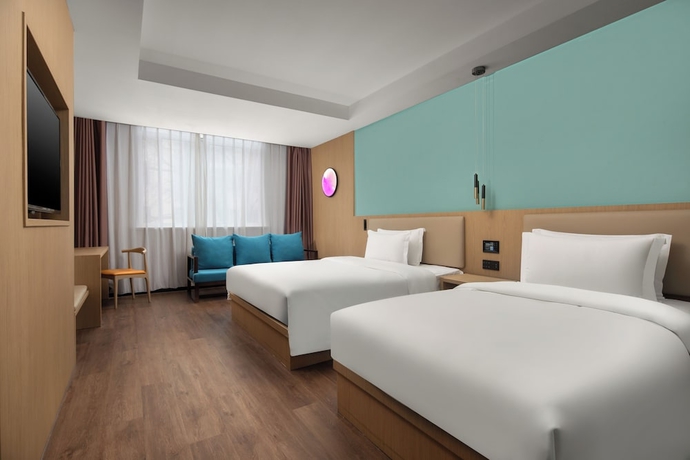 Imagen de la habitación del Hotel JinglaiMeichuan Road Branch. Foto 4