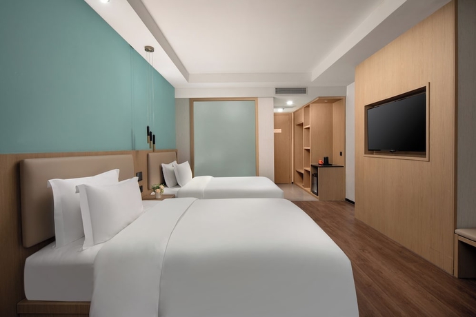 Imagen de la habitación del Hotel JinglaiMeichuan Road Branch. Foto 7