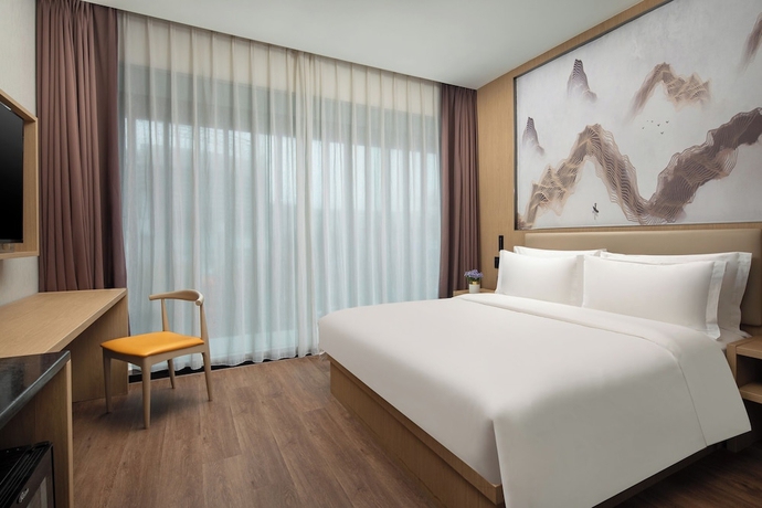 Imagen de la habitación del Hotel JinglaiMeichuan Road Branch. Foto 13