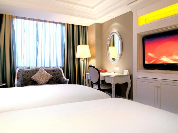 Imagen de la habitación del Hotel Jingli. Foto 5