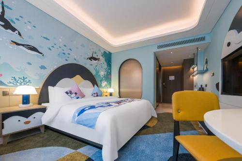Imagen de la habitación del Hotel Jingqiao Haichang Penguin Wassim Shanghai. Foto 13