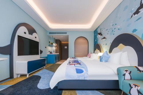 Imagen de la habitación del Hotel Jingqiao Haichang Penguin Wassim Shanghai. Foto 14