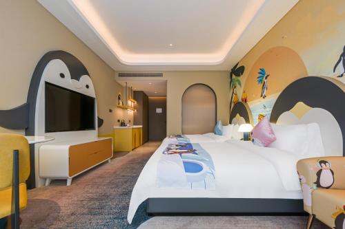 Imagen de la habitación del Hotel Jingqiao Haichang Penguin Wassim Shanghai. Foto 16