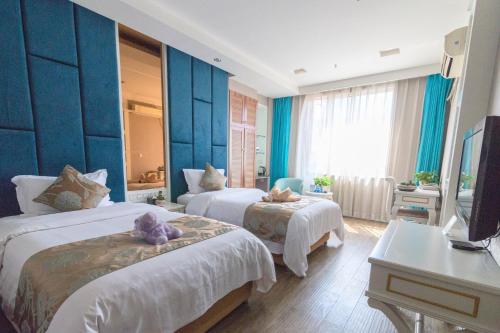 Imagen de la habitación del Hotel Jingsheng. Foto 6