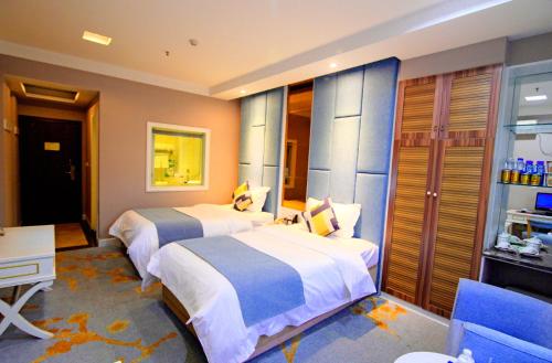 Imagen de la habitación del Hotel Jingsheng. Foto 7