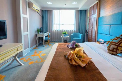 Imagen de la habitación del Hotel Jingsheng. Foto 8