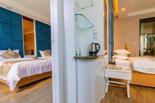 Imagen de la habitación del Hotel Jingsheng. Foto 9