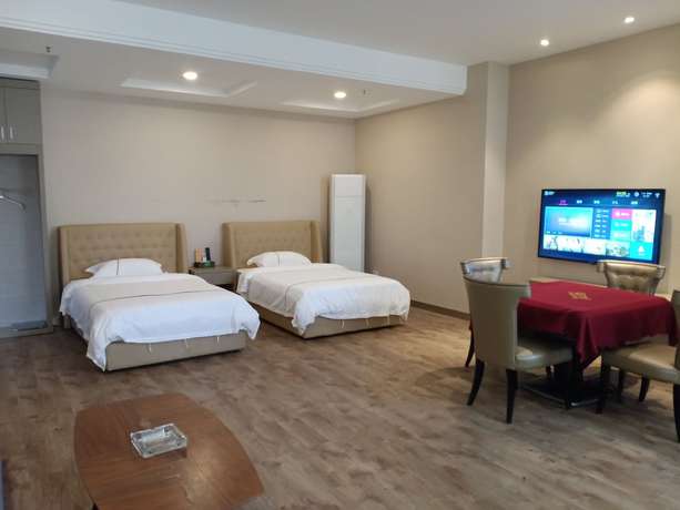 Imagen de la habitación del Hotel Jingtai Lidu. Foto 11