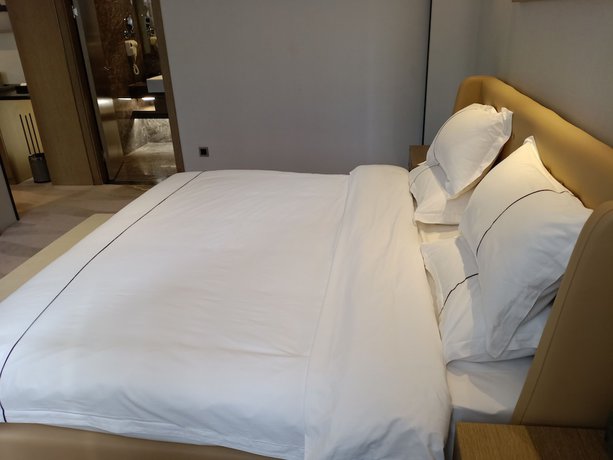 Imagen de la habitación del Hotel Jingtai Lidu. Foto 13