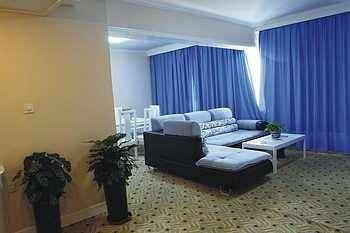 Imagen de la habitación del Hotel Jingu - Urumqi. Foto 11