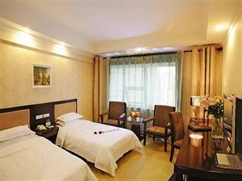 Imagen de la habitación del Hotel Jingu - Urumqi. Foto 13