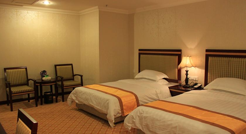 Imagen de la habitación del Hotel Jinguan. Foto 6