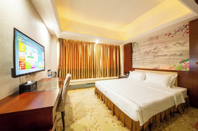 Imagen de la habitación del Hotel Jinguan Holiday. Foto 2