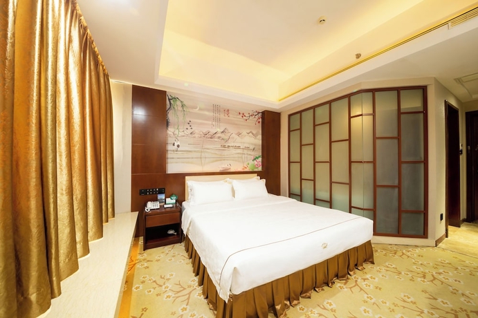 Imagen de la habitación del Hotel Jinguan Holiday. Foto 3