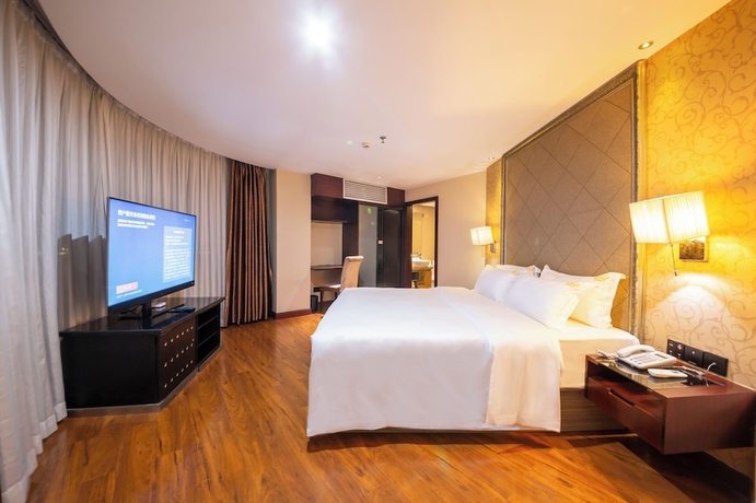 Imagen de la habitación del Hotel Jinguan Holiday. Foto 5