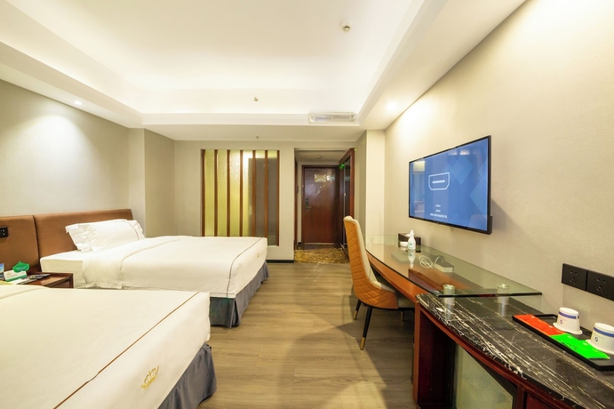 Imagen de la habitación del Hotel Jinguan Holiday. Foto 10