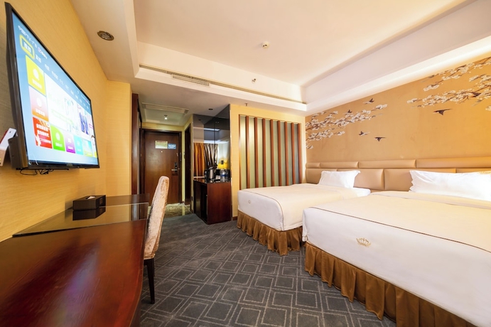 Imagen de la habitación del Hotel Jinguan Holiday. Foto 12