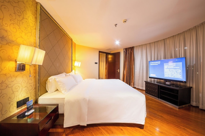 Imagen de la habitación del Hotel Jinguan Holiday. Foto 14
