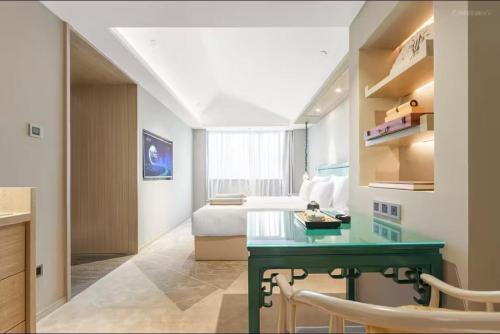 Imagen general del Hotel Jinhua Four Seasons Ruili. Foto 7