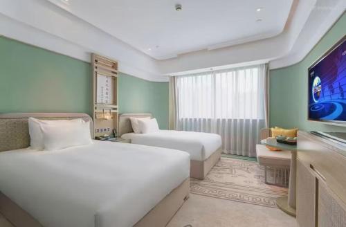 Imagen general del Hotel Jinhua Four Seasons Ruili. Foto 9