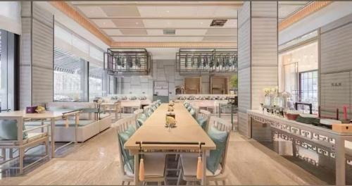 Imagen general del Hotel Jinhua Four Seasons Ruili. Foto 11