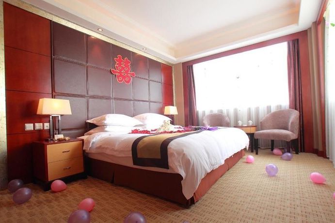 Imagen de la habitación del Hotel Jinhua Hotel - Dalian. Foto 4