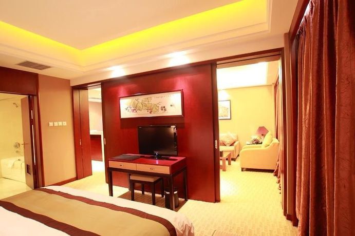 Imagen de la habitación del Hotel Jinhua Hotel - Dalian. Foto 8