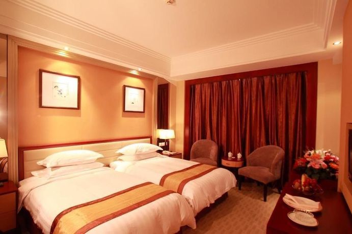 Imagen de la habitación del Hotel Jinhua Hotel - Dalian. Foto 11