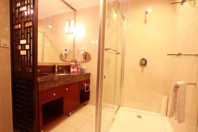 Imagen de la habitación del Hotel Jinhua Hotel - Dalian. Foto 12