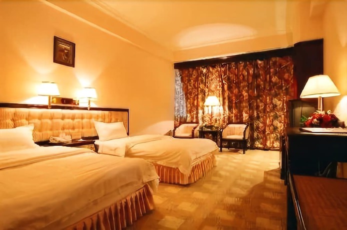 Imagen de la habitación del Hotel Jinhua International Hotel - Kunming. Foto 3