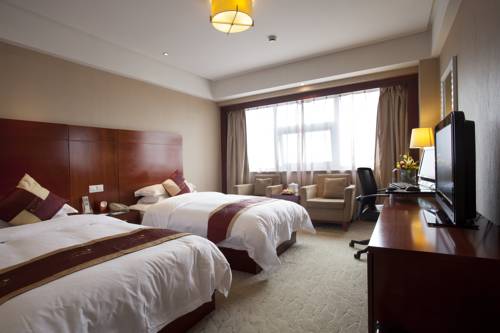 Imagen de la habitación del Hotel Jinhua Narada. Foto 1
