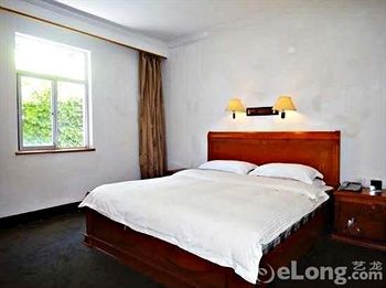 Imagen de la habitación del Hotel Jinhuan - Jiuhuashan. Foto 6