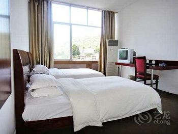 Imagen de la habitación del Hotel Jinhuan - Jiuhuashan. Foto 8