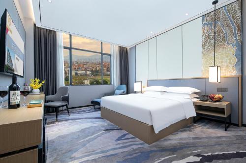 Imagen de la habitación del Hotel Jinhui Royal Navigation International. Foto 19