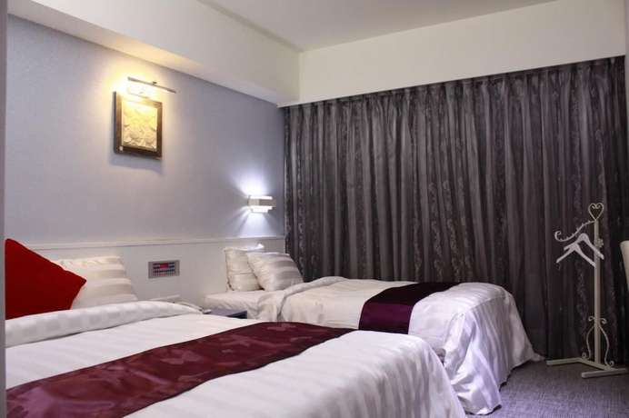 Imagen de la habitación del Hotel Jinhwa Hotel. Foto 6