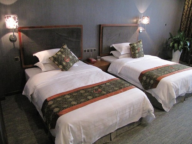 Imagen de la habitación del Hotel Jinjiang Hotel. Foto 4