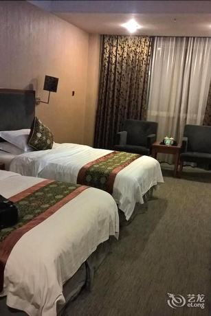 Imagen de la habitación del Hotel Jinjiang Hotel. Foto 7