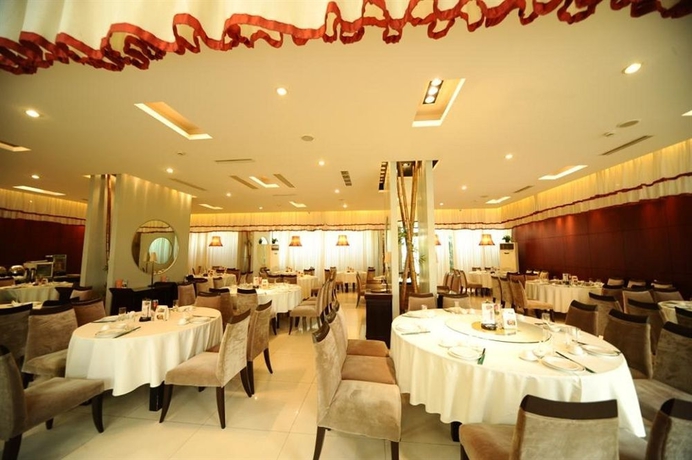 Imagen del bar/restaurante del Hotel Jinjiang Huamu Inn Shanghai. Foto 4