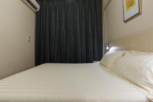 Imagen de la habitación del Hotel Jinjiang Inn Beijing Hepingmen. Foto 8