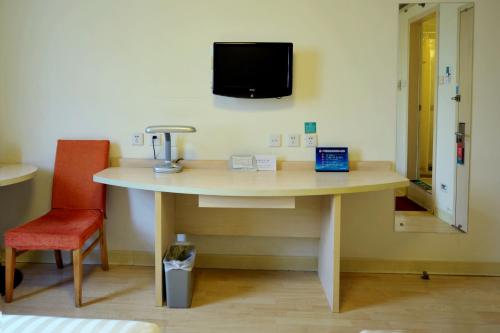 Imagen de la habitación del Hotel Jinjiang Inn Beijing West Bus Staion. Foto 6