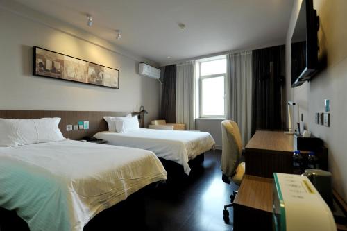 Imagen de la habitación del Hotel Jinjiang Inn Beijing West Bus Staion. Foto 8
