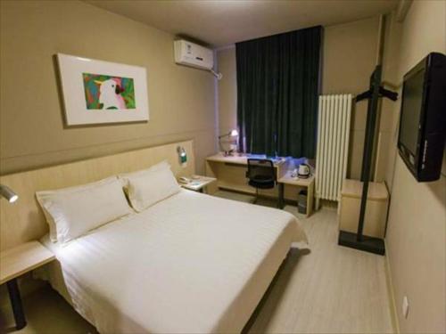 Imagen de la habitación del Hotel Jinjiang Inn Beijing Zhushikou. Foto 4